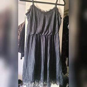 Sparkly black dress with lace accents. Size small.